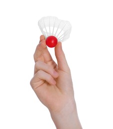 Boy with badminton shuttlecock on white background, closeup