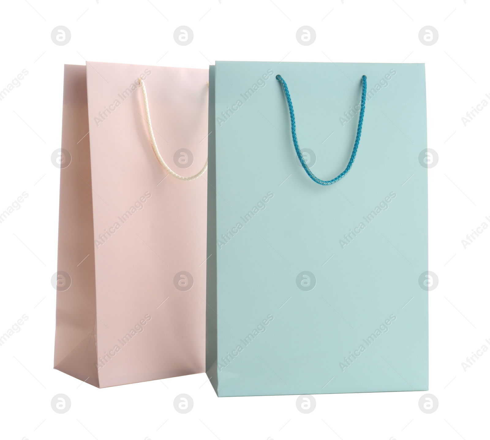 Photo of Different paper shopping bags isolated on white