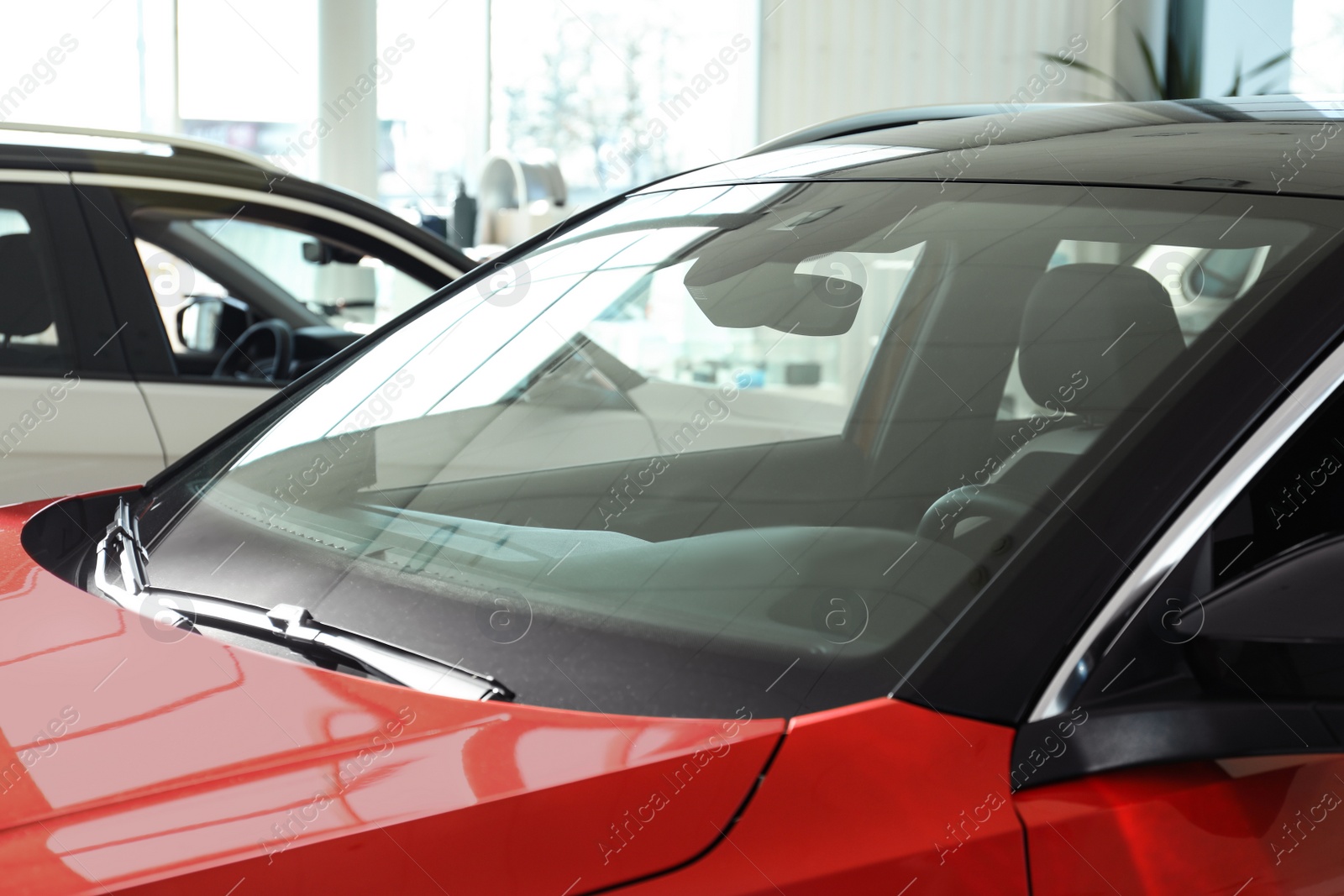 Photo of Modern car with tinting foil on window, closeup