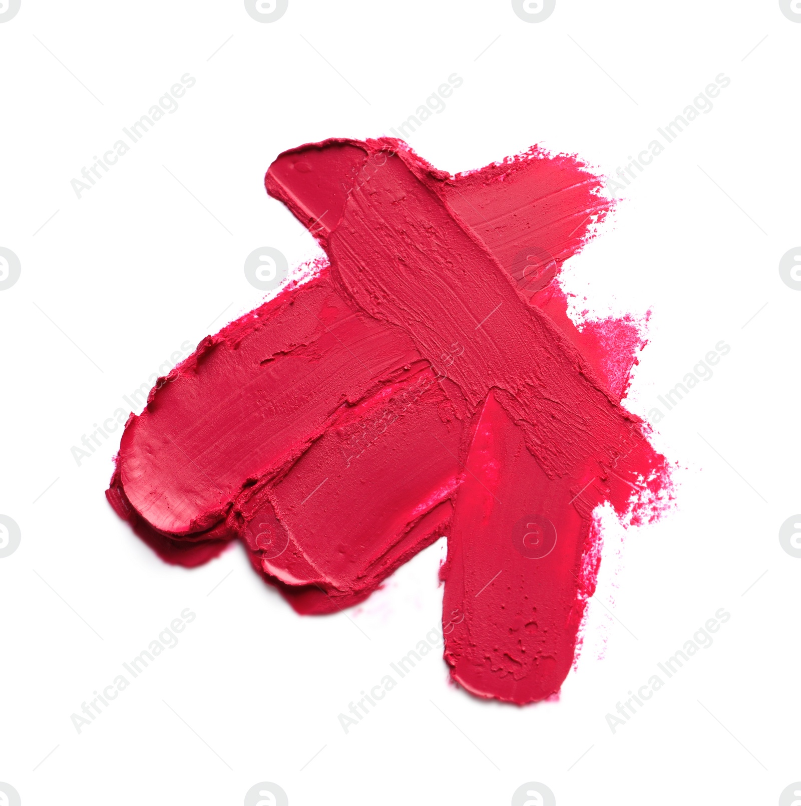 Photo of Smears of bright lipstick on white background, top view