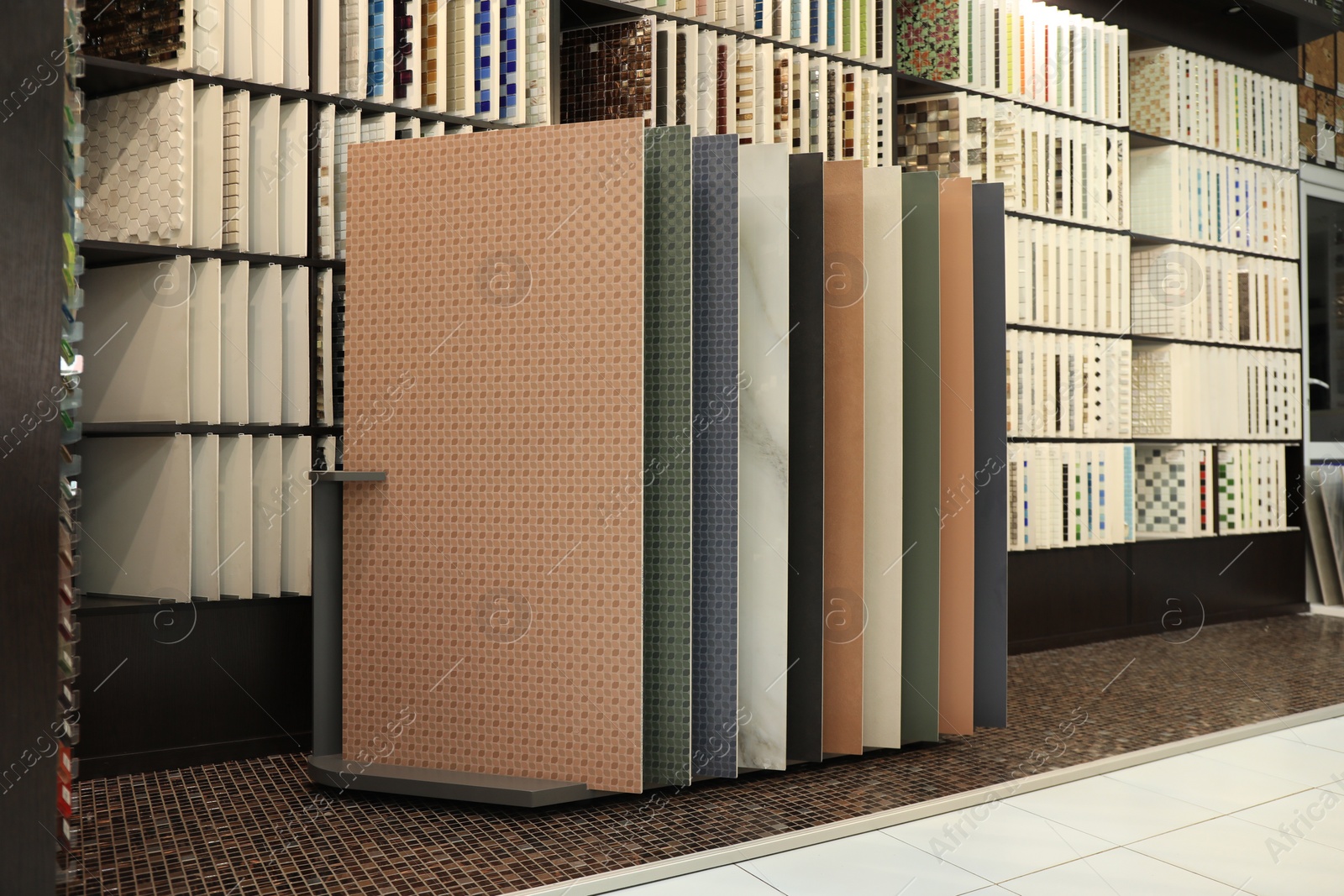 Photo of Many different samples of tiles on display in store