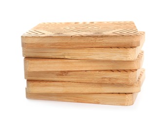 Stack of wooden cup coasters on white background