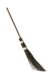 Old broom with wooden handle isolated on white