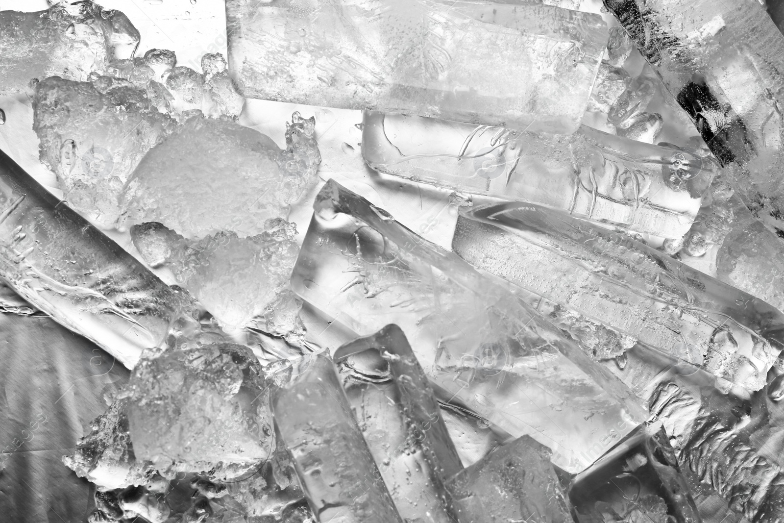 Photo of Many pieces of ice melting as background