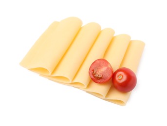 Photo of Slices of tasty fresh cheese and tomatoes isolated on white, above view