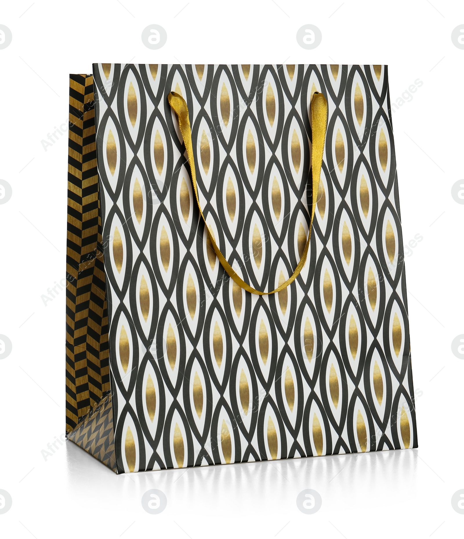 Photo of Stylish gift paper bag isolated on white