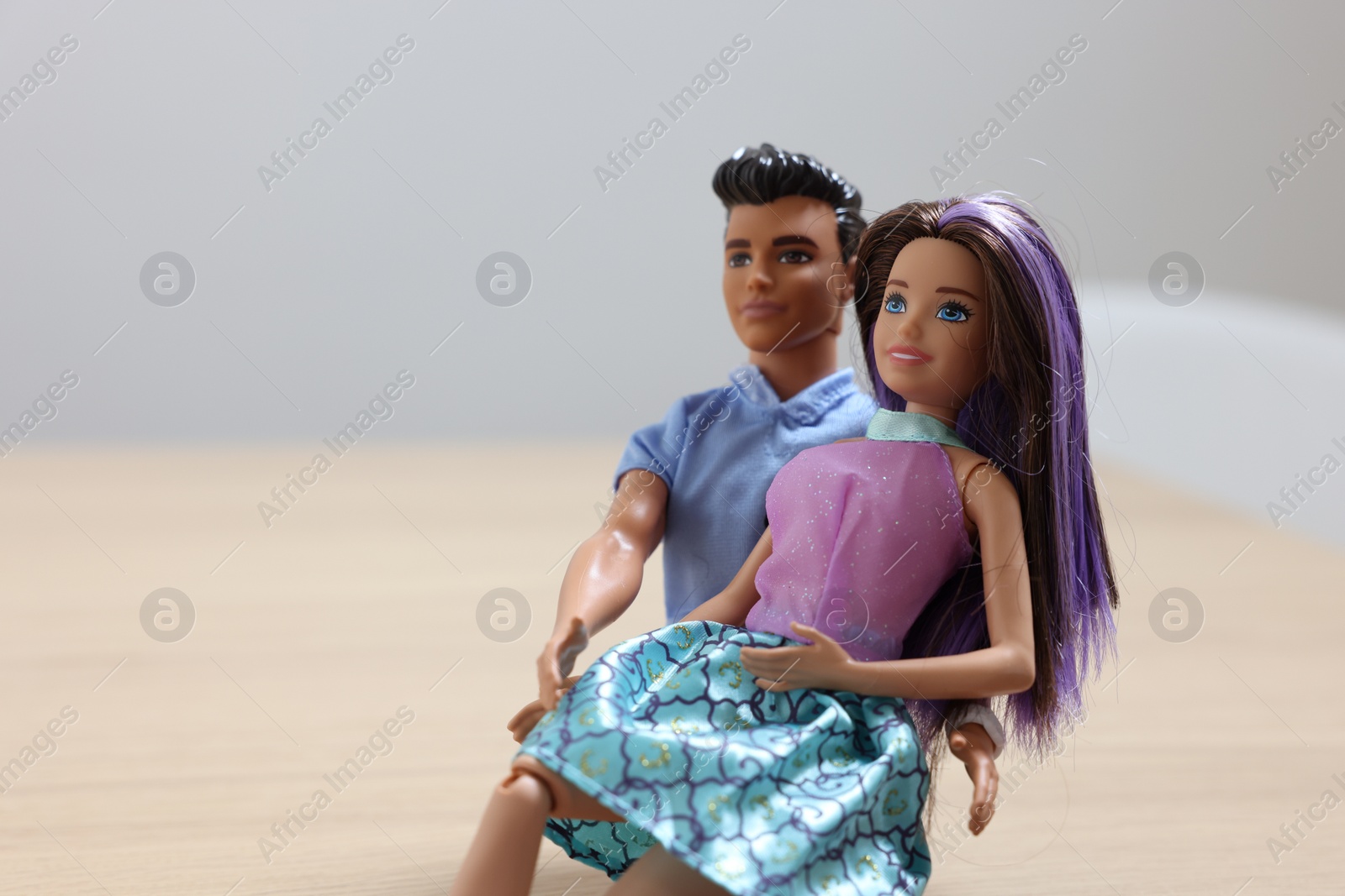 Photo of Leiden, Netherlands - September 20, 2023: Stylish Barbie and Ken dolls on blurred background, space for text