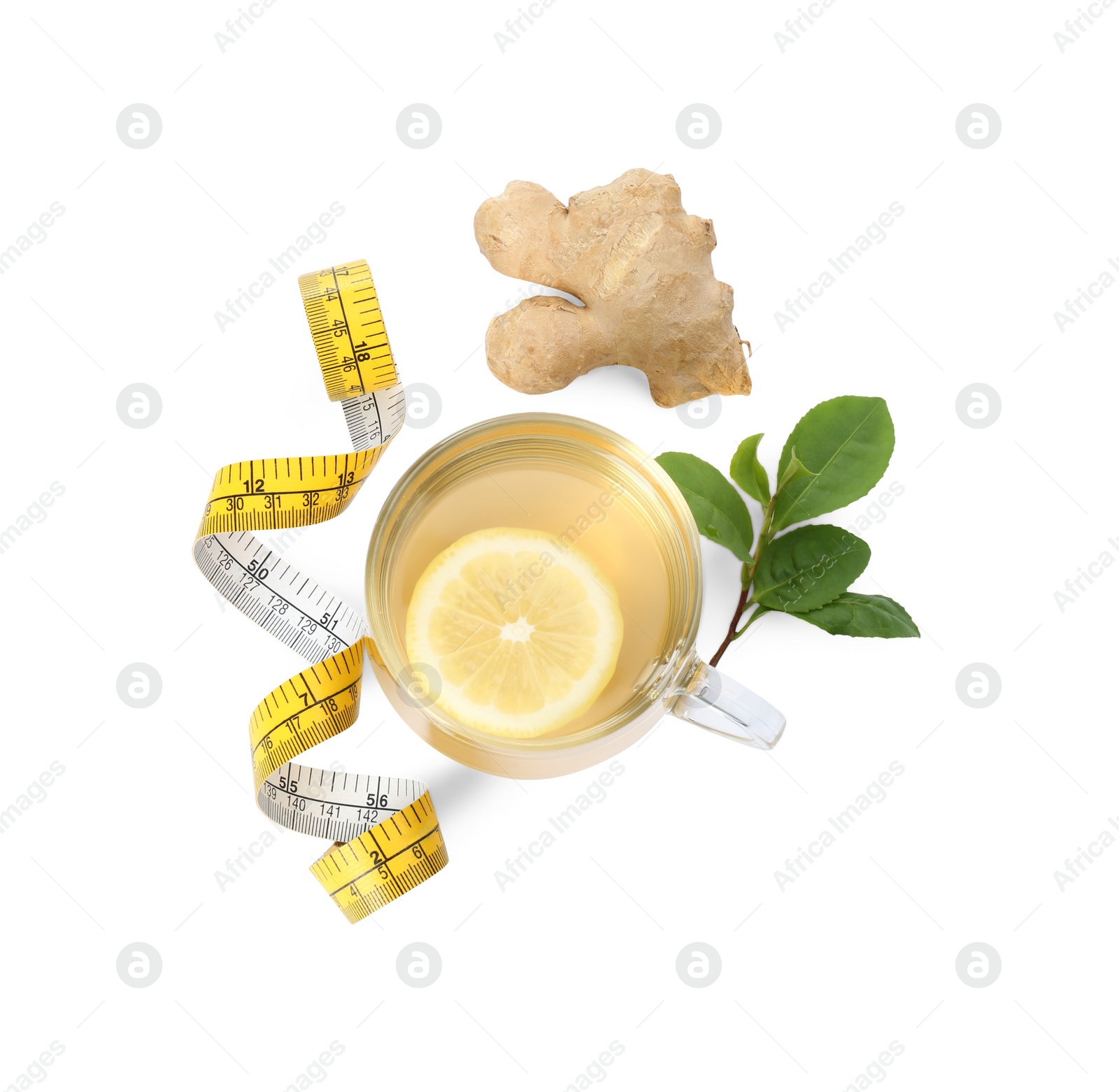 Photo of Diet herbal tea, measuring tape, ginger and leaves on white background, top view