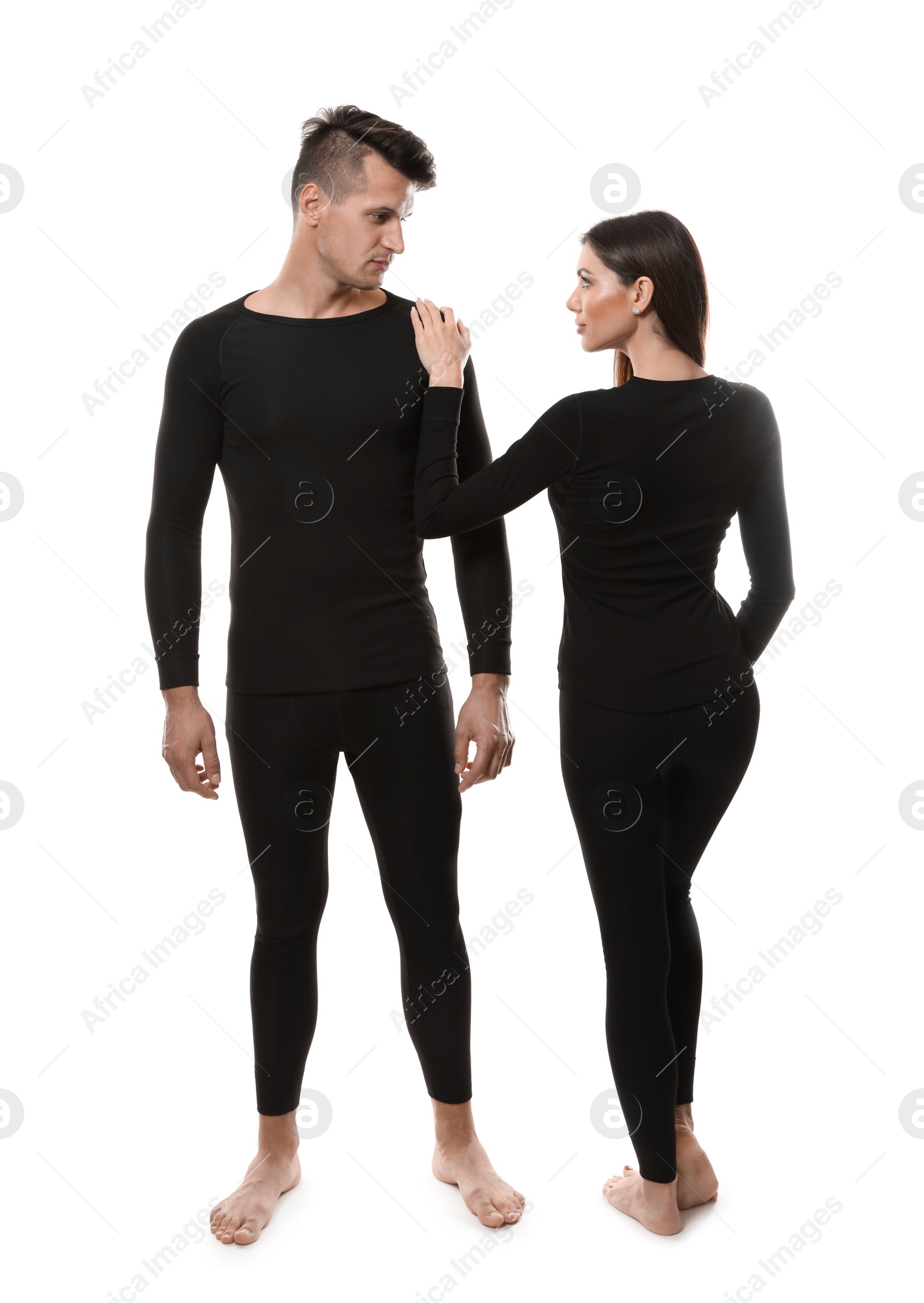 Photo of Couple wearing thermal underwear isolated on white