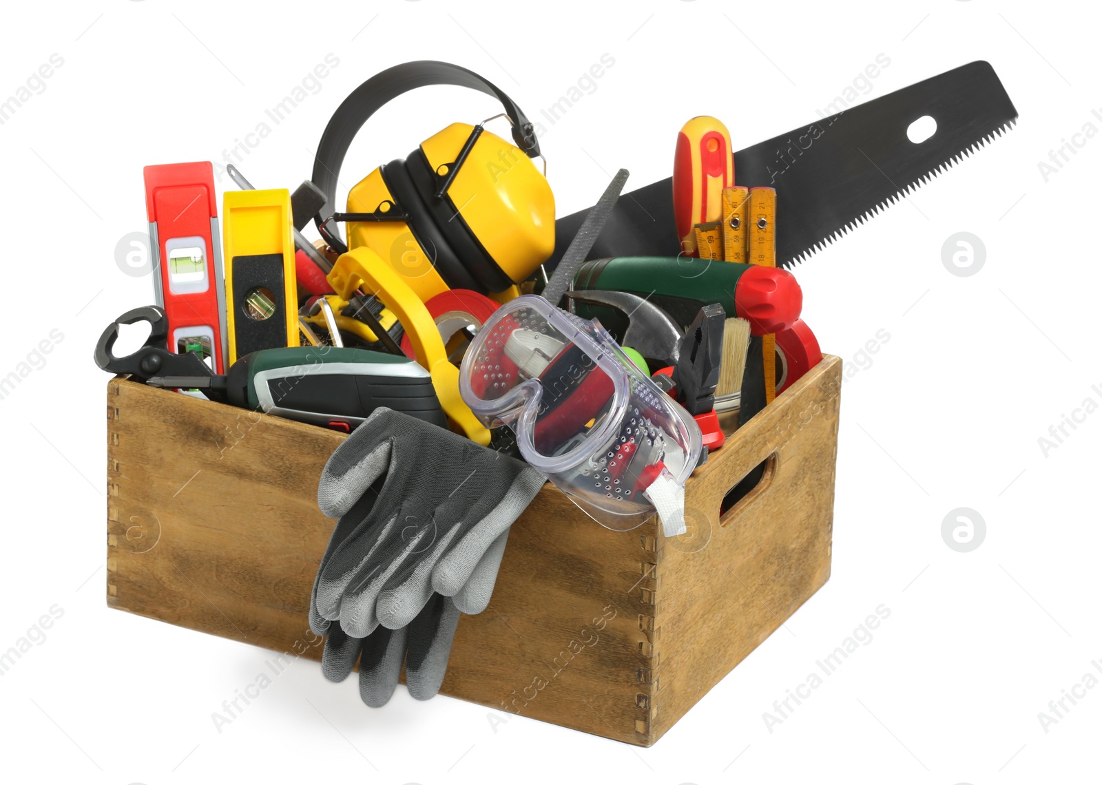 Photo of Wooden box with different tools isolated on white