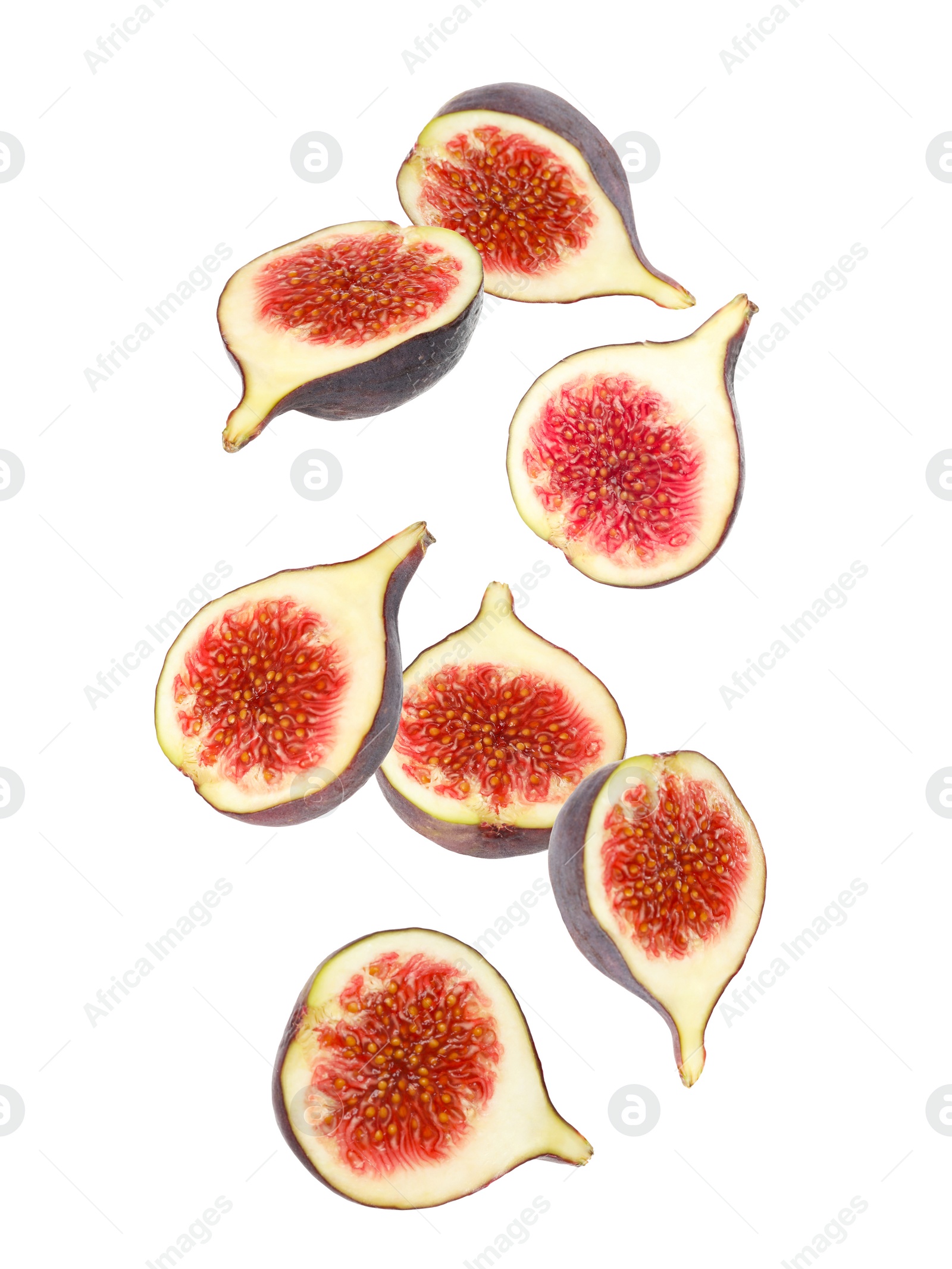 Image of Falling tasty ripe figs on white background