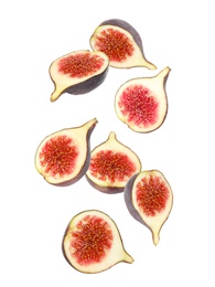 Image of Falling tasty ripe figs on white background