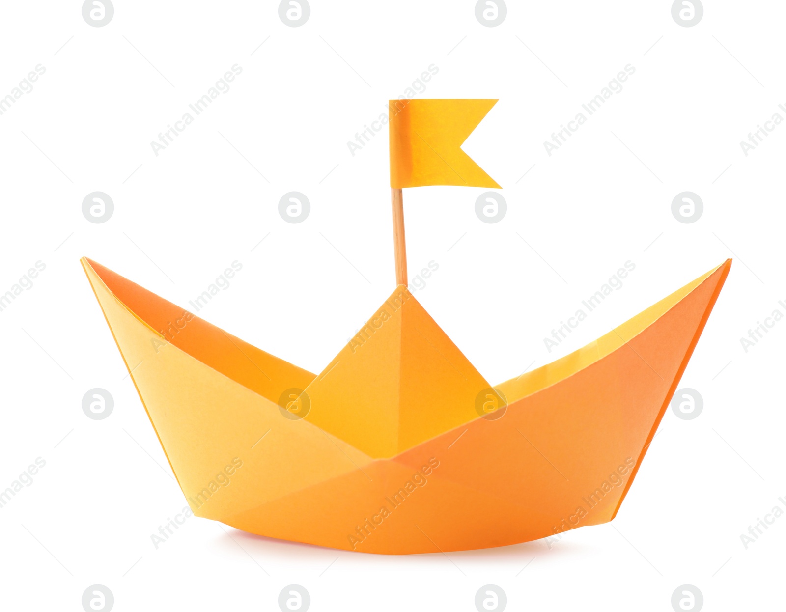 Photo of Handmade orange paper boat with flag isolated on white. Origami art