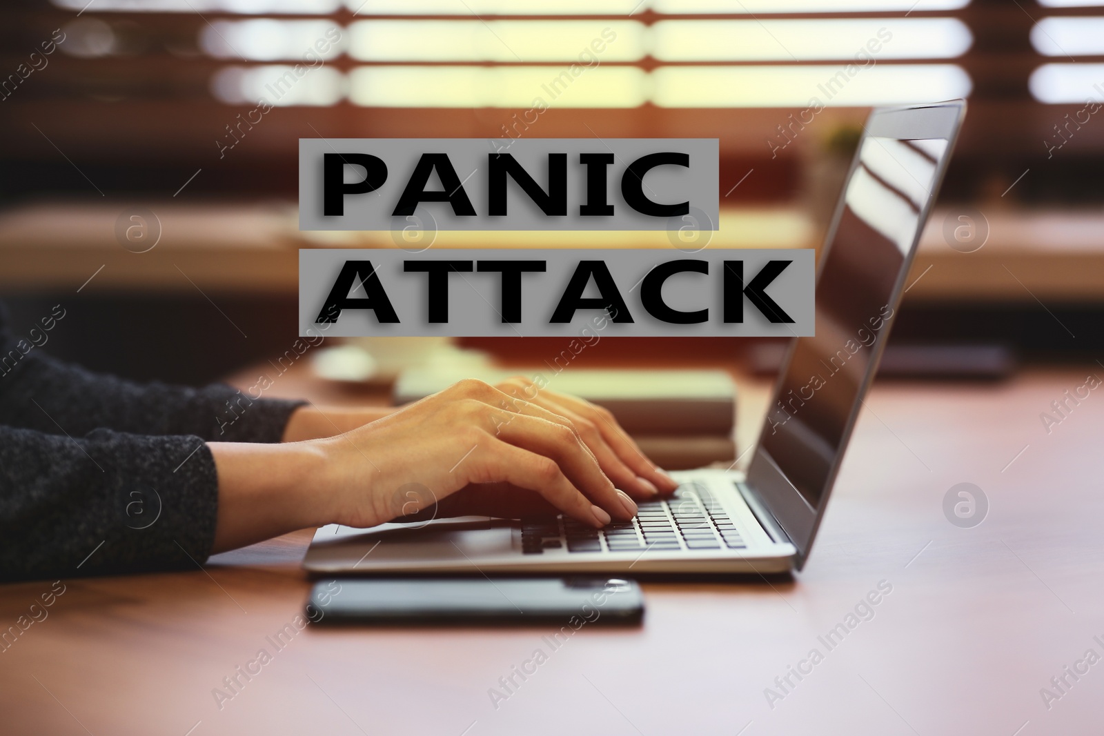 Image of Woman working with laptop, closeup. Use information safely to avoid panic attack