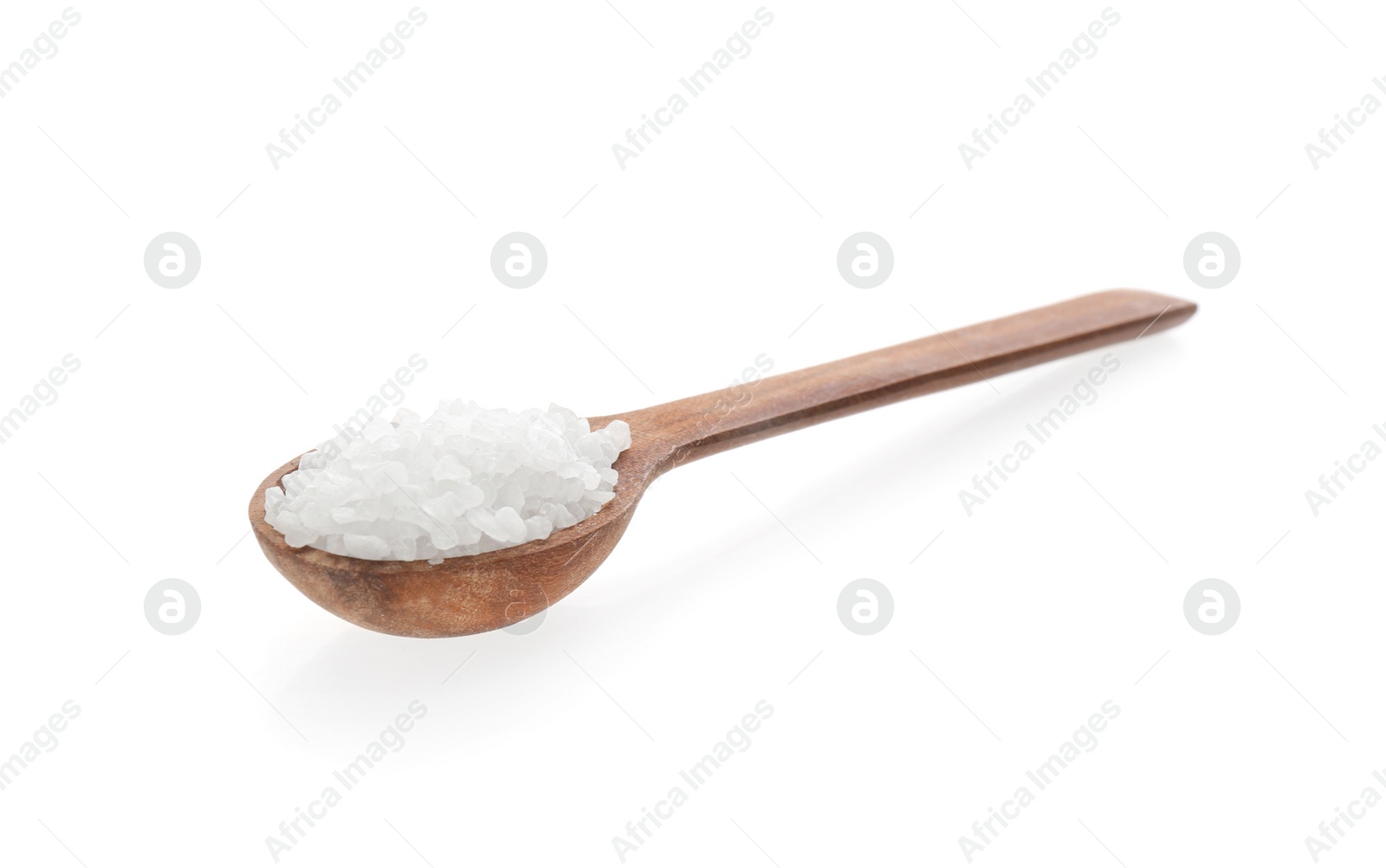 Photo of Wooden spoon with salt isolated on white