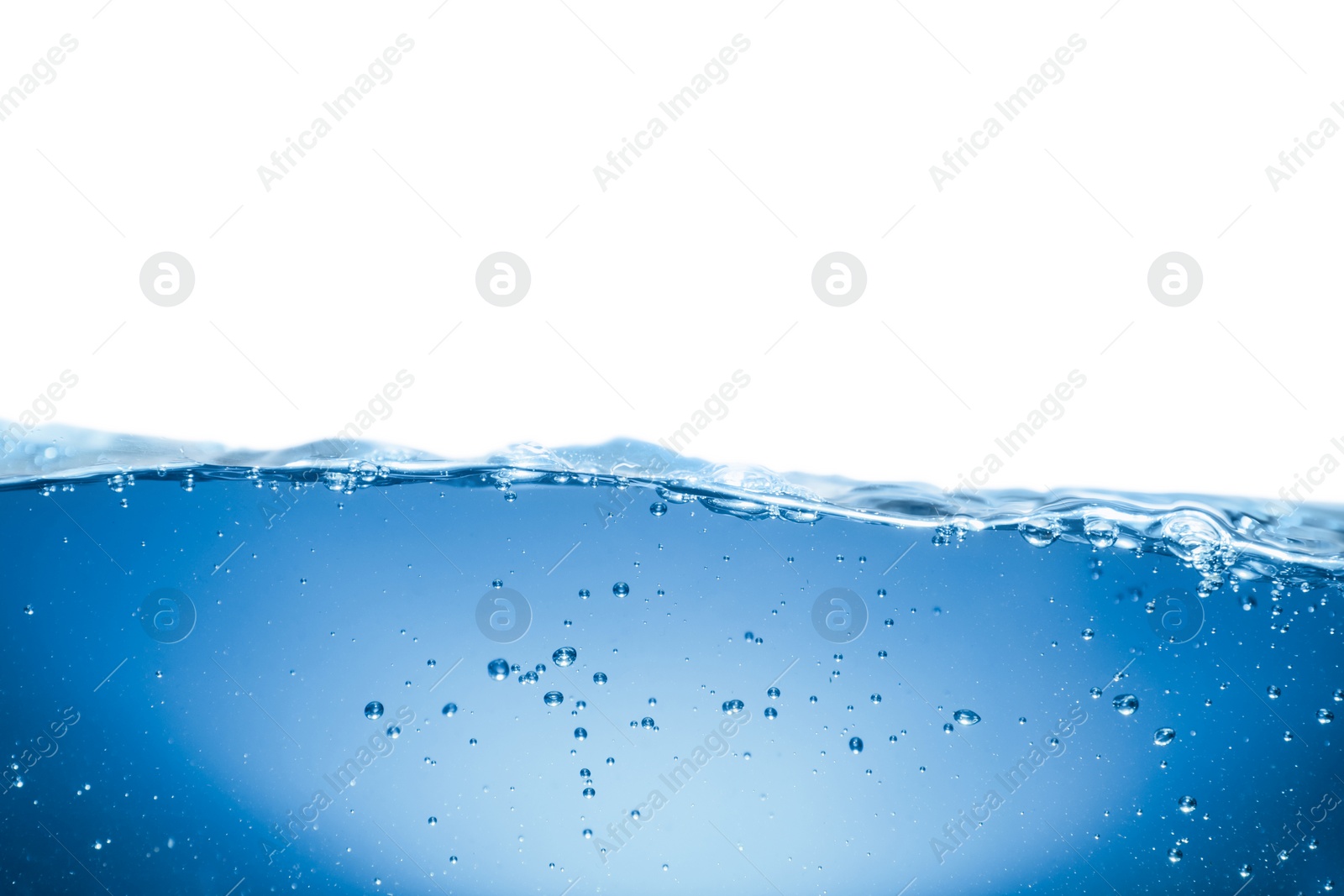 Photo of Bubbles in blue water on white background