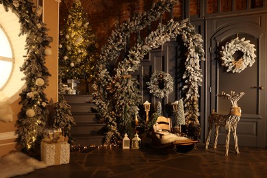 Photo of Stylish room interior with different Christmas decor