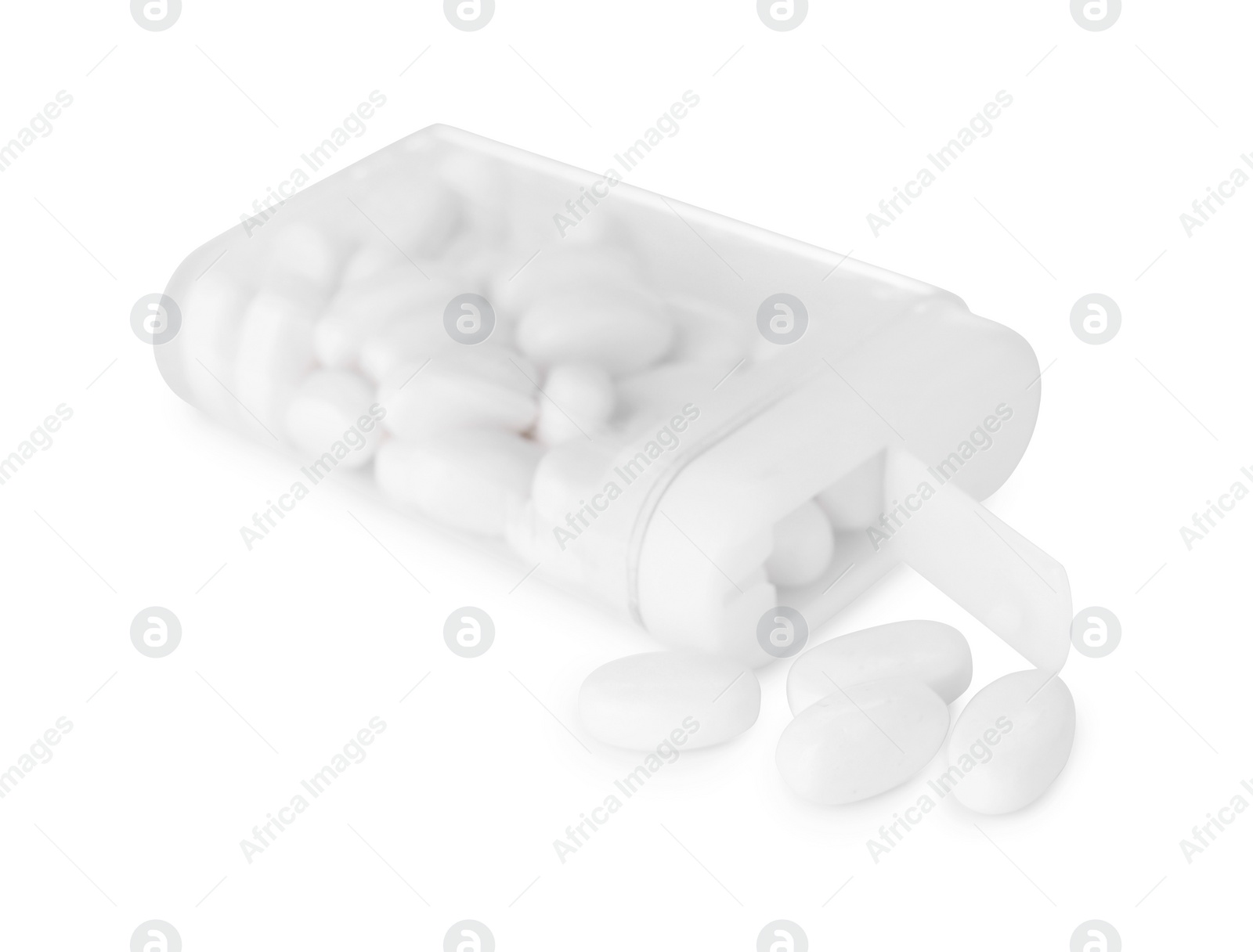 Photo of Tasty mint dragee candies with box on white background