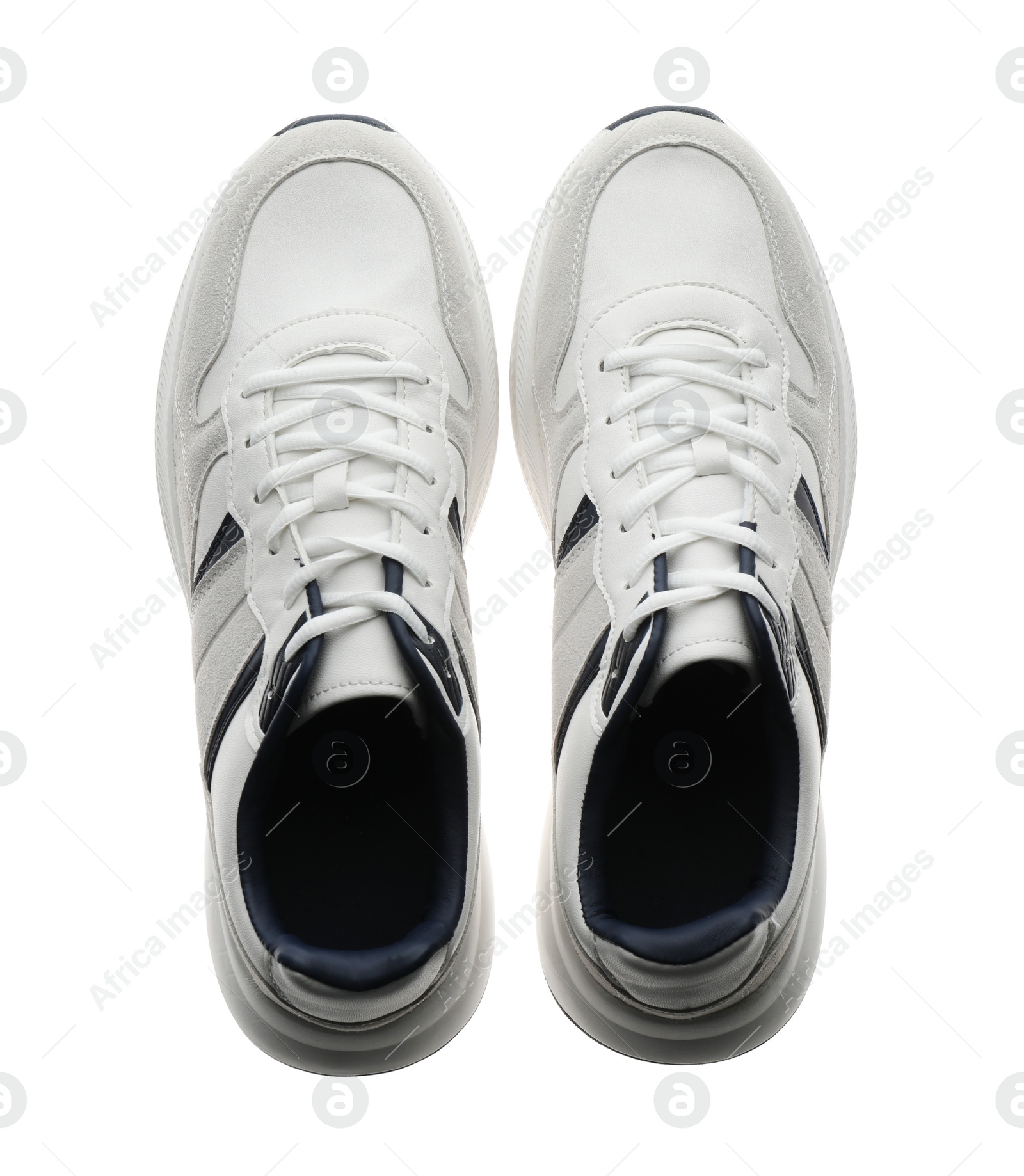 Photo of Pair of stylish sneakers on white background, top view