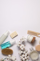 Bath accessories. Flat lay composition with personal care products on white background, space for text