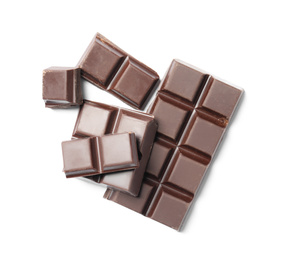Photo of Pieces of delicious dark chocolate isolated on white, top view