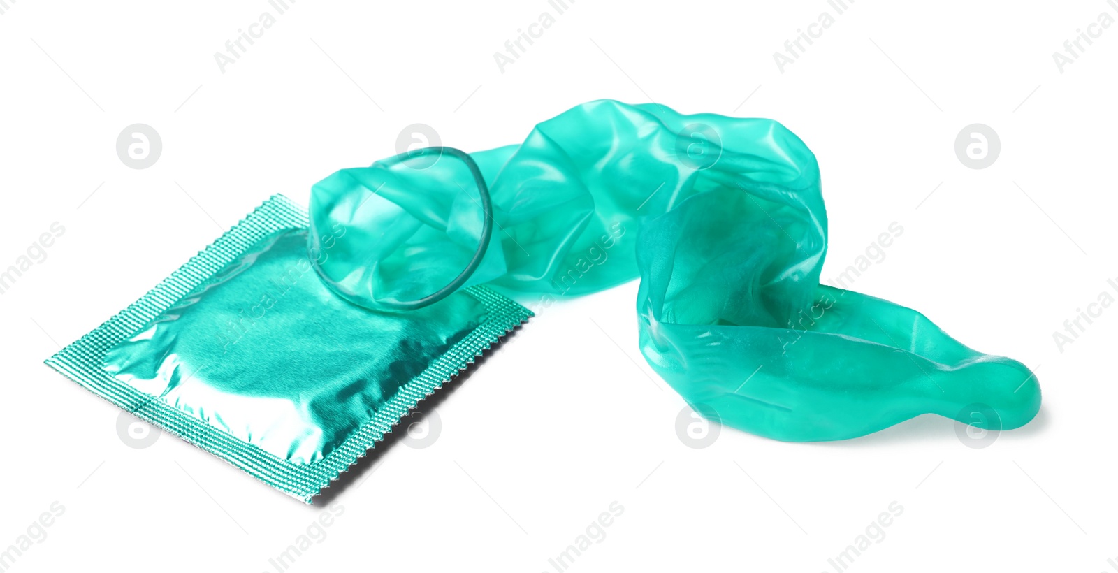 Image of Unrolled turquoise condom and package on white background. Safe sex