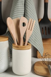 Photo of Set of different kitchen utensils on white table