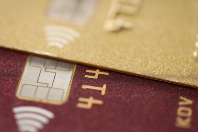 Two plastic credit cards as background, macro view