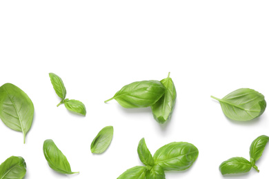 Photo of Fresh green basil leaves on white background, top view