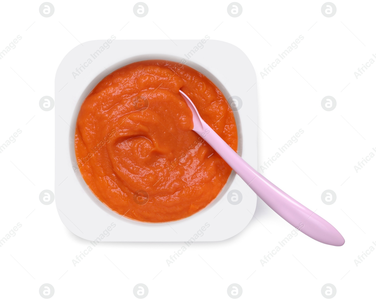 Photo of Container with healthy baby food and spoon isolated on white, top view