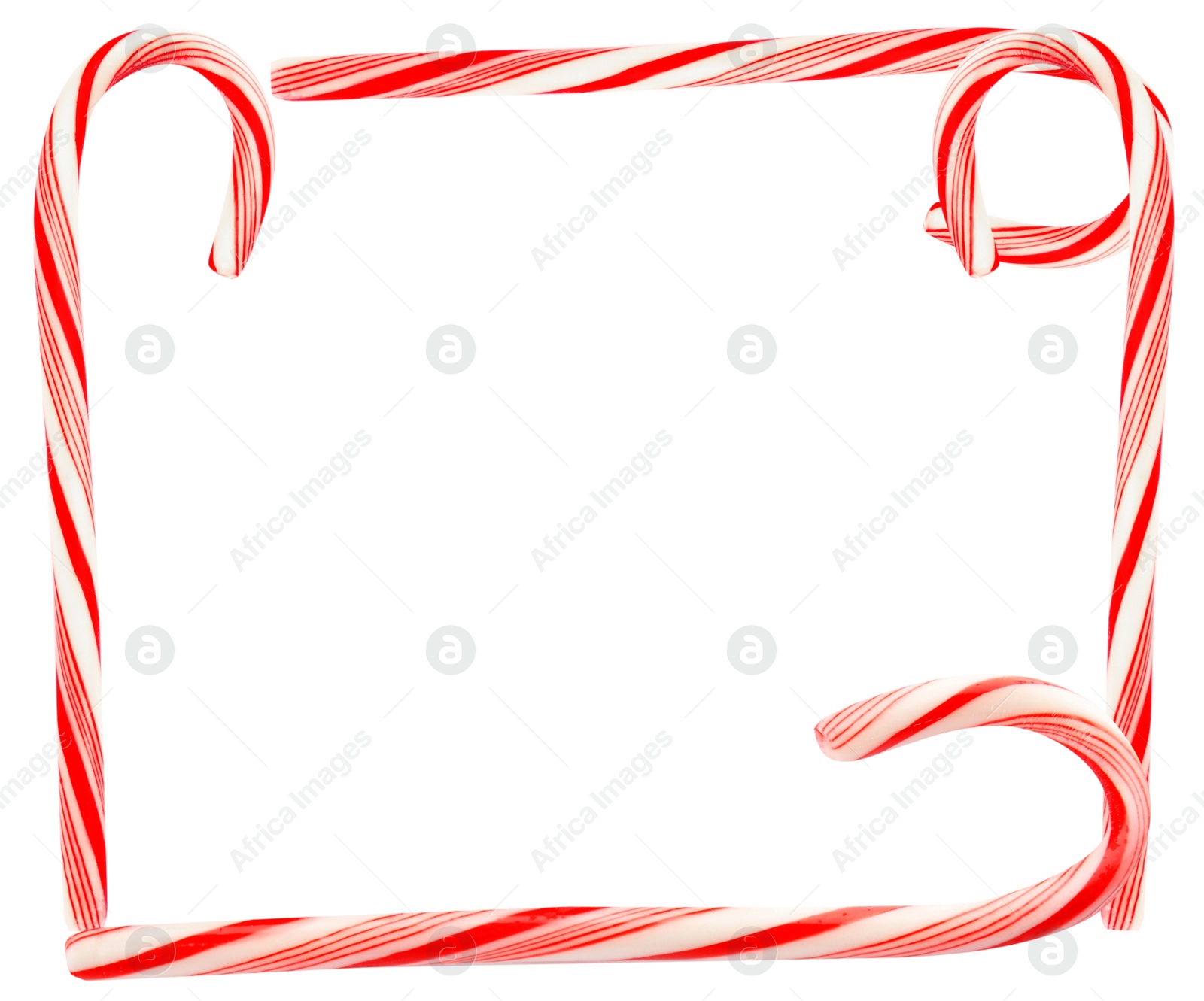 Image of Frame of tasty Christmas candy canes on white background