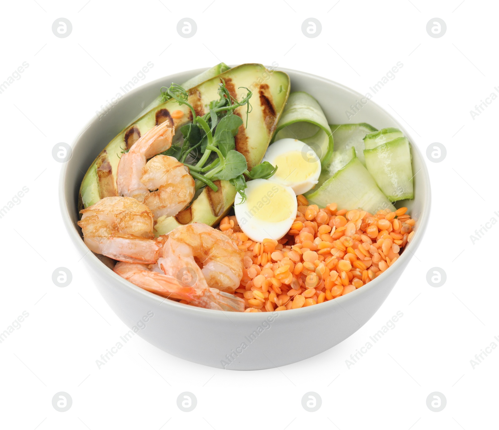 Photo of Delicious lentil bowl with avocado, shrimps, egg and cucumber on white background