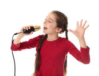 Photo of Cute girl singing in microphone on white background