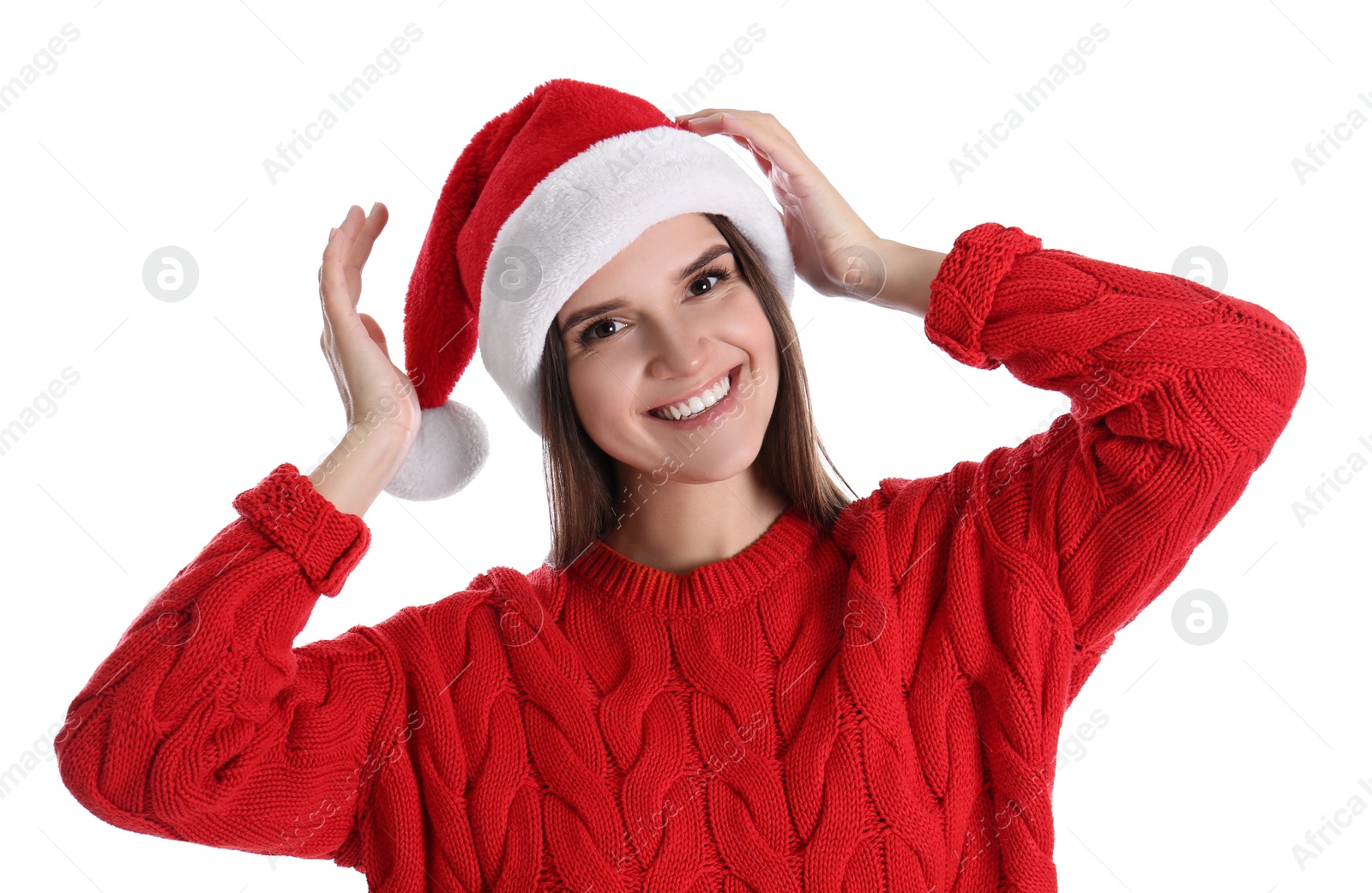 Photo of Pretty woman in Santa hat and red sweater on white background