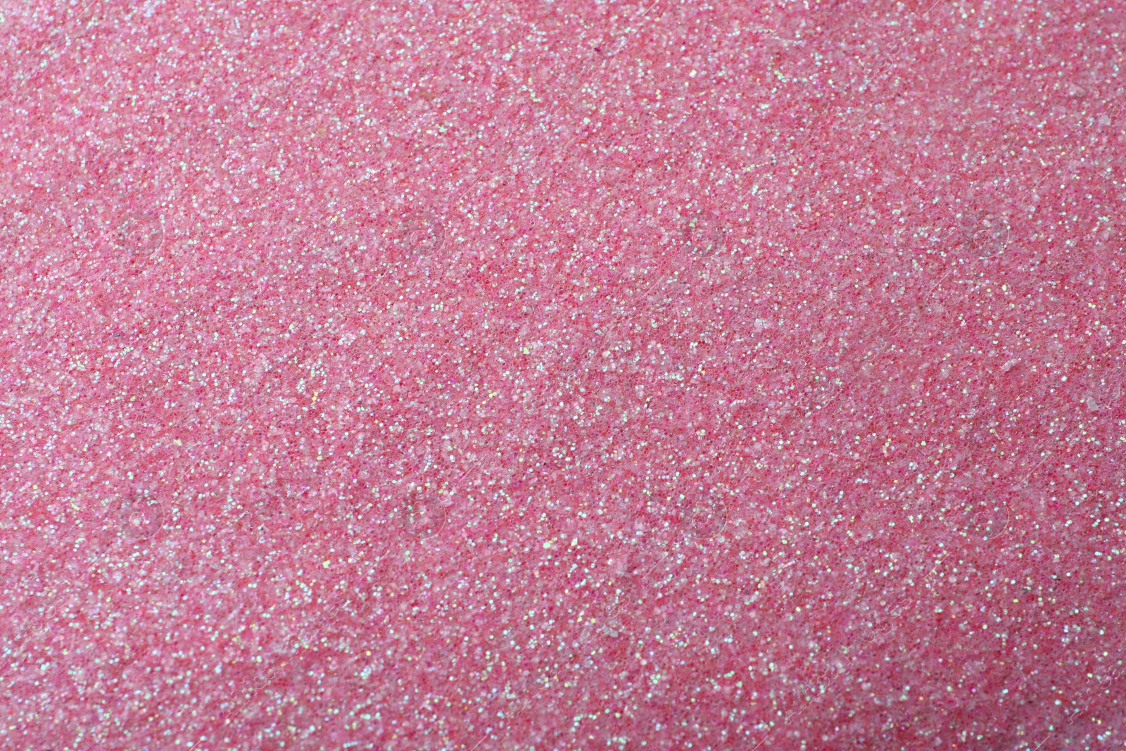 Photo of Beautiful shiny pink glitter as background, closeup