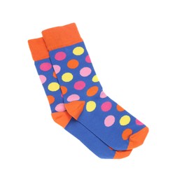 Photo of Colorful socks on white background, top view