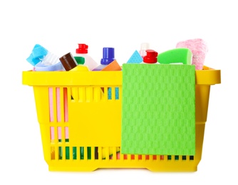 Photo of Yellow shopping basket with different household chemicals on white background