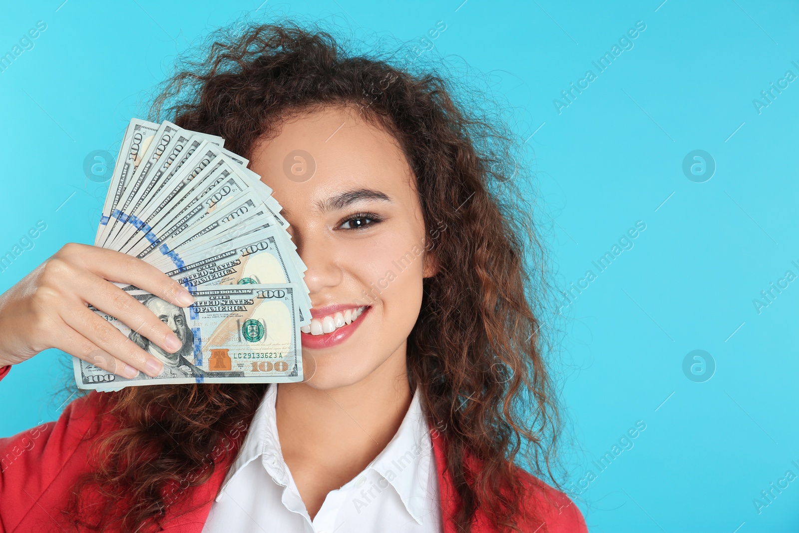 Photo of African-American businesswoman with money on color background. Space for text