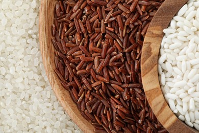 Photo of Dishes with different sorts of rice as background, top view