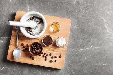 Photo of Ingredients for coffee scrub on wooden board