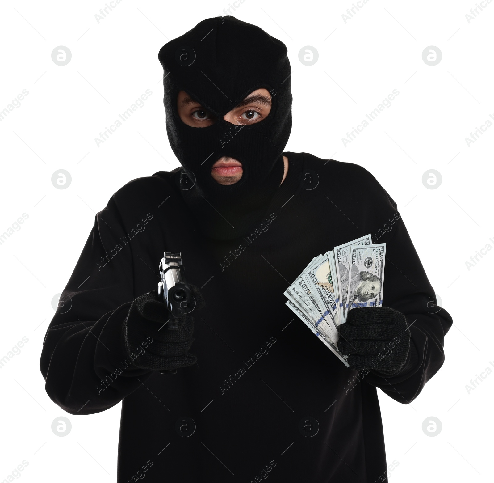 Photo of Thief in balaclava with gun and money on white background