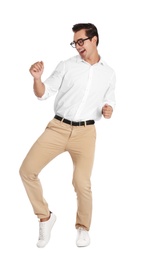 Photo of Handsome young man with glasses dancing on white background