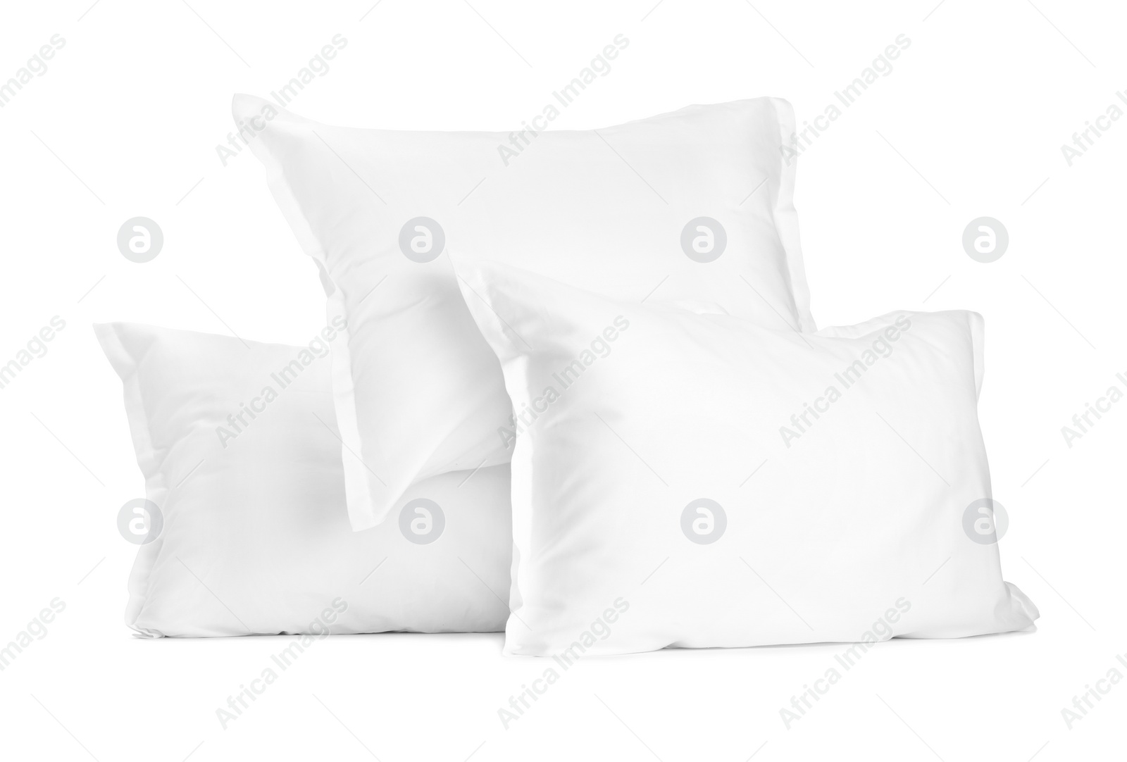 Photo of Many new soft pillows isolated on white