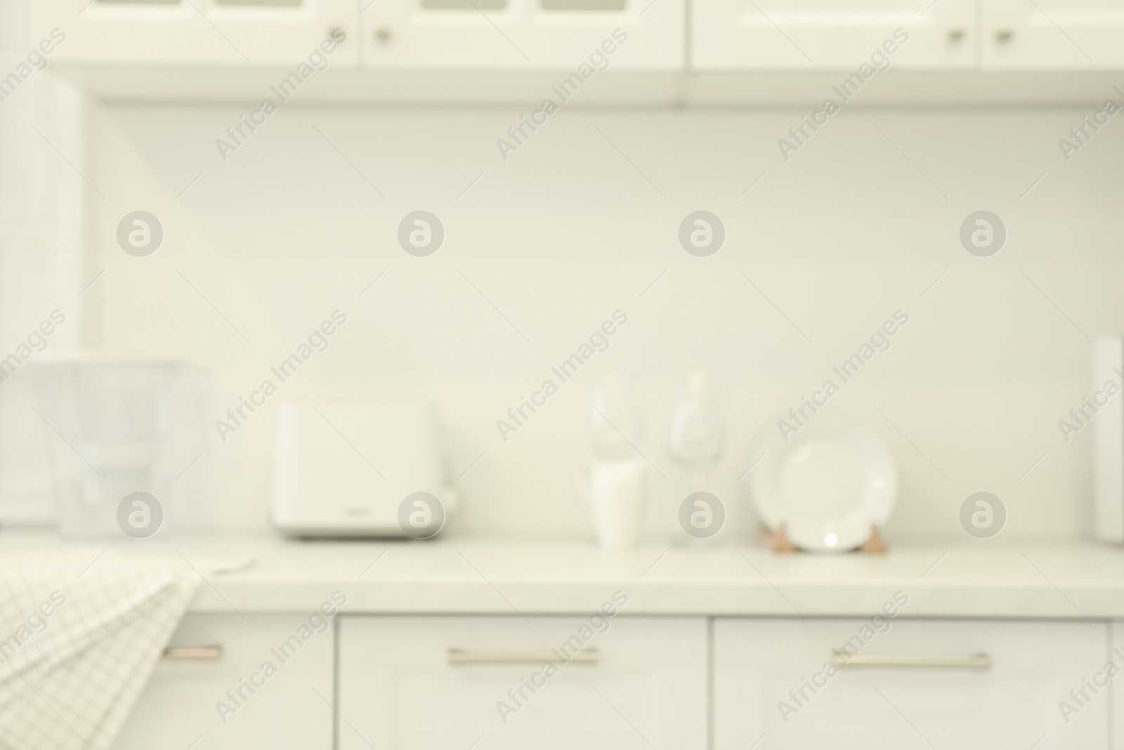 Photo of Blurred view of modern kitchen. Interior design