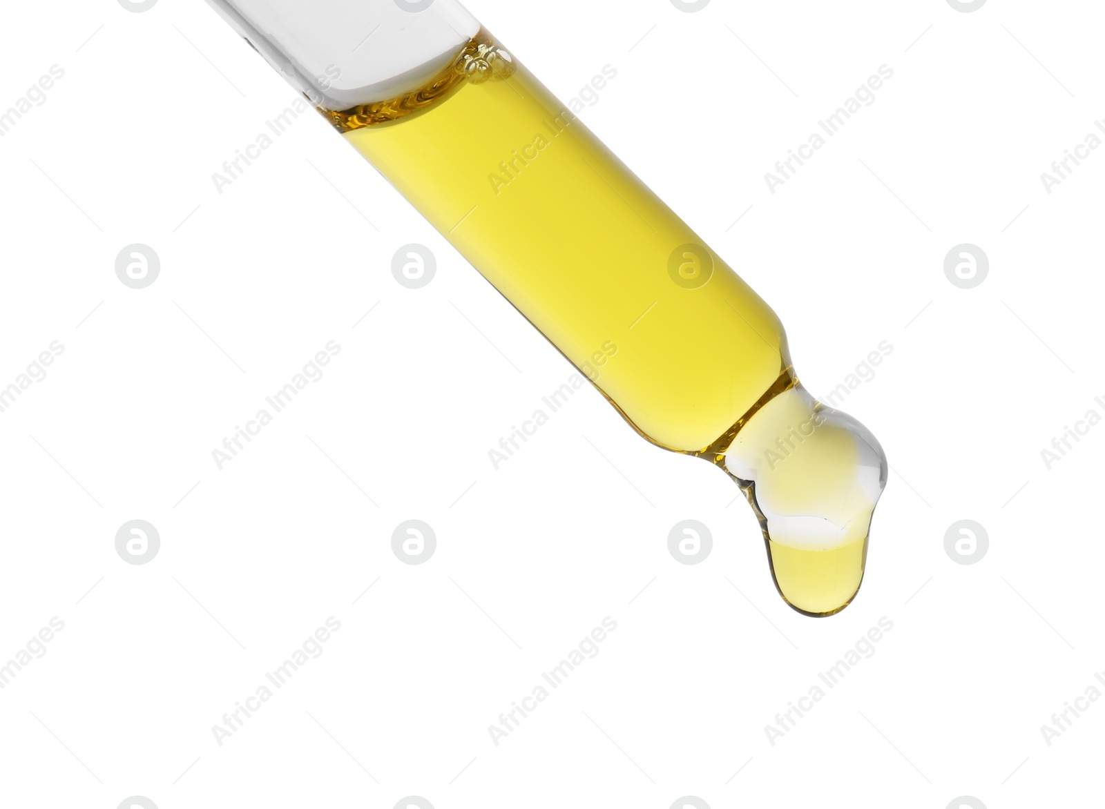 Photo of Dripping tincture from pipette isolated on white