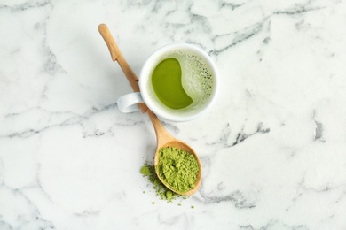 Flat lay composition with matcha tea on marble background