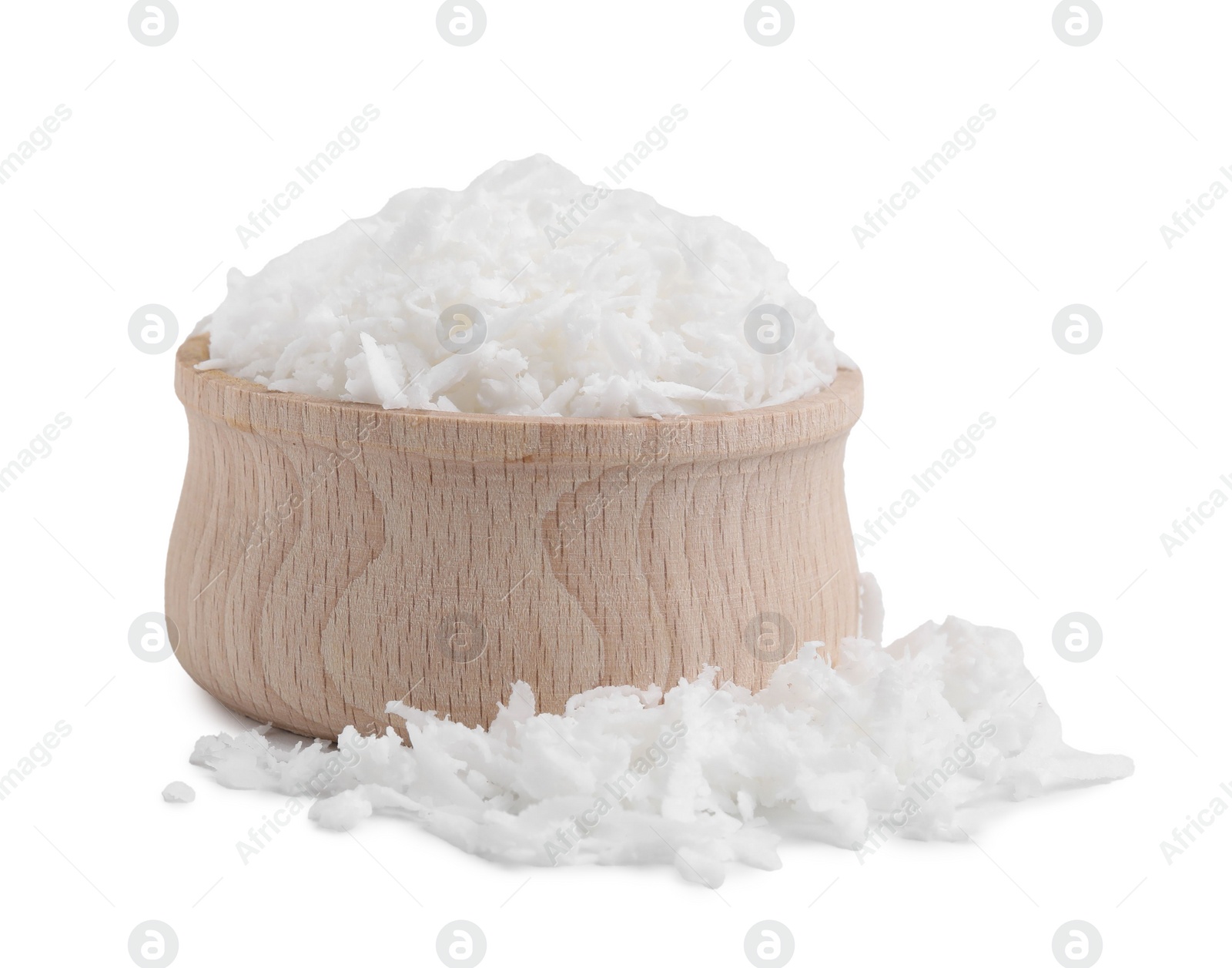 Photo of Coconut flakes in bowl isolated on white