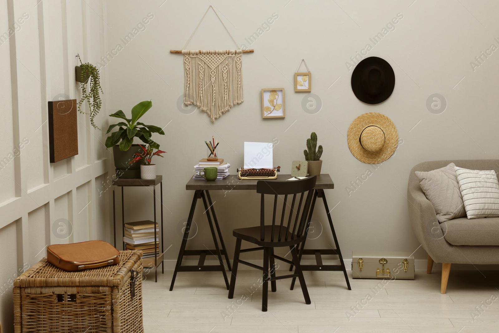 Photo of Writer's workplace with typewriter on dark table desk in room