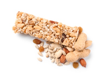 Photo of Grain cereal bar and nuts on white background. Healthy snack
