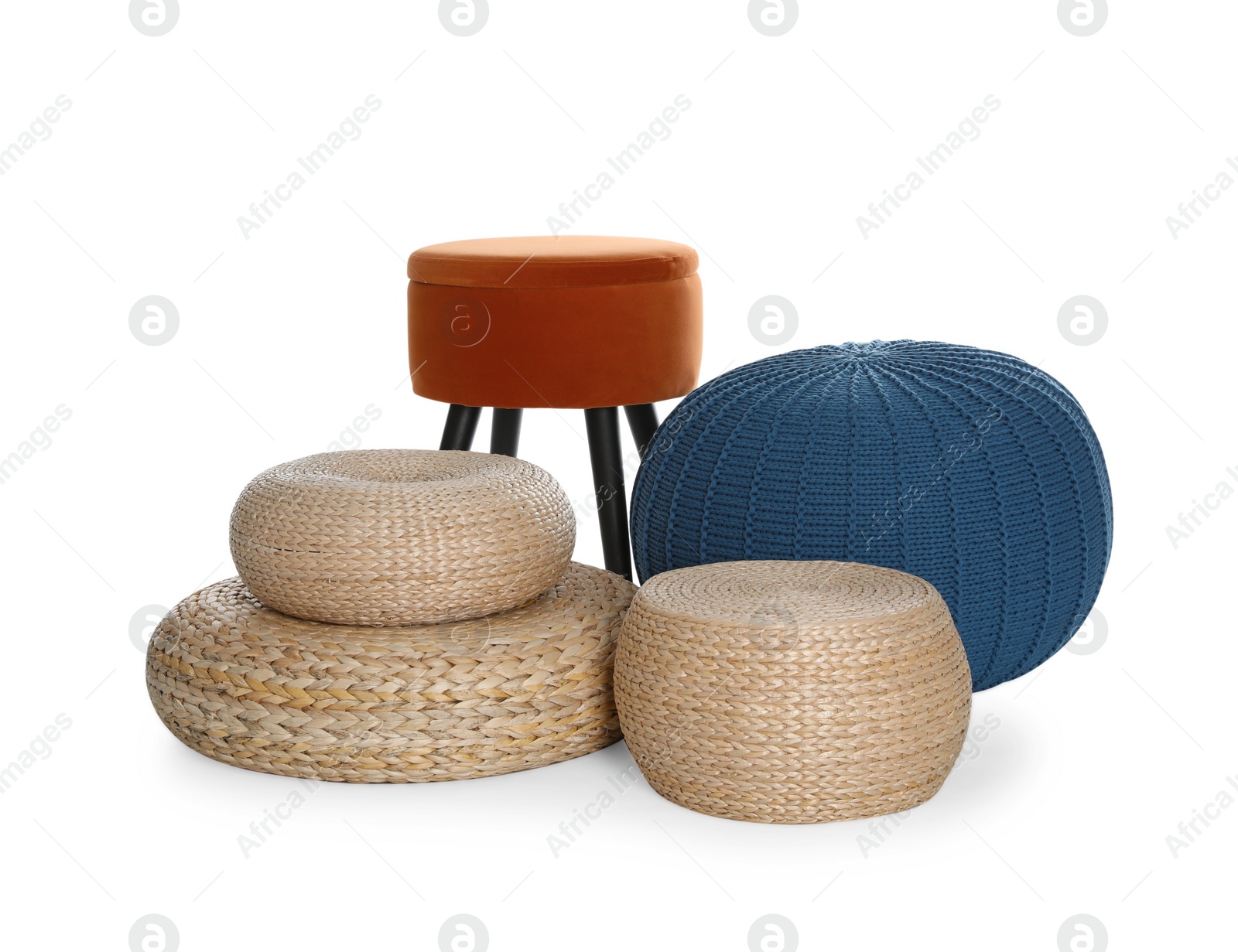 Photo of Different poufs on white background. Home design